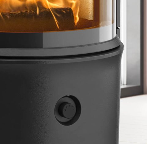 Detail: air control button on black wood stove Jøtul F 174 Zensoric
